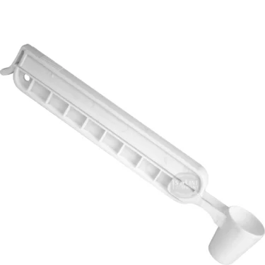 The Ascaso Coffee Bag Clip / Scoop is a long, white tool with a small scoop—perfect for reaching grounds in deep containers and ideal for your Ascaso setup or any coffee bag. © 2025 1st-line.com