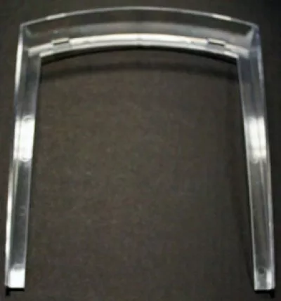 The Ascaso I..124 Plastic Banister is a transparent, curved plastic piece forming an open arch, shown on a dark surface. © 2025 1st-line.com