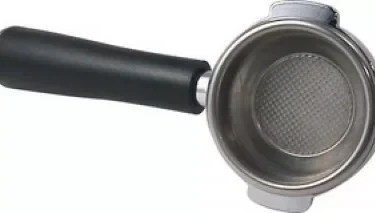 The Ascaso I..539 Professional 58mm Complete Filter Holder, featuring a black handle and metal basket, is shown from above holding coffee grounds. Compatible with Ascaso espresso machines. © 2025 1st-line.com