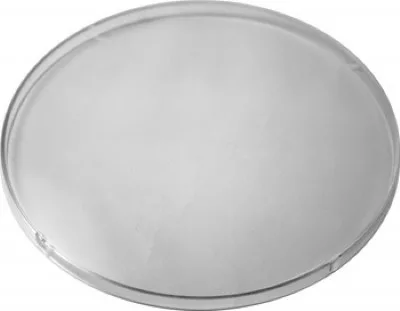 The Ascaso MI.112 Bean Hopper Cover is a clear, round, flat glass disc with smooth edges, shown on a white background. © 2025 1st-line.com