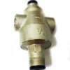The Ascaso V..326 1/2 Pressure Reducer is metallic, has three ports, black end caps on each side, and product markings V..326 and 1/2 on the body. © 2025 1st-line.com
