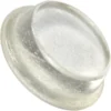 The Bezzera 7999904 Adhesive Rubber Top is a clear, round bumper pad with a slightly raised center that cushions surfaces and prevents slipping or scratching. © 2025 1st-line.com