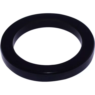 The DISCONTINUED Ascaso I.2281 Portafilter Gasket (73.5x54x8.5 mm) is a black, circular rubber sealing ring with a smooth surface, designed for a precise fit in compatible portafilters. © 2025 1st-line.com