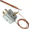 The Elektra 00659035 Thermostat has a metal body, copper capillary tube, and sensing bulb for accurate temperature control. It features electrical terminals and a rotating adjustment shaft for appliance use. © 2025 1st-line.com
