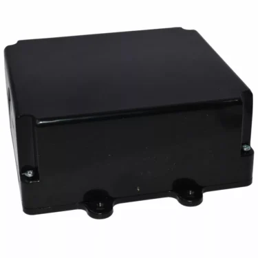 The Elektra 03659034 230V Control Box/Brain Unit is a black rectangular enclosure with rounded edges, four mounting holes, and is shown from the front—perfect for use as a control or brain unit. © 2025 1st-line.com