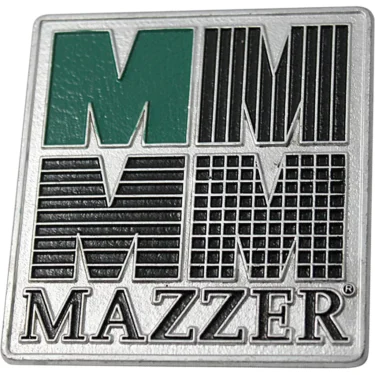 The Mazzer S000TAA02 Back Plate features a metallic badge with bold, stylized green and black MM lettering above MAZZER in capital letters. © 2025 1st-line.com