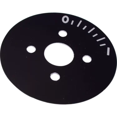 The Mazzer S000TAA03 Timer Switch Plate is a black, circular plate with five white markings, a zero, and four small holes around a larger central hole; designed for Mazzer equipment. © 2025 1st-line.com