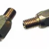 Two metal jets with threaded ends and hexagonal bodies rest on a white surface, resembling the 1st-line Gold3HoleSilvia Steam Wand Tip—3 hole, gold, for Silvia V2 or older. © 2025 1st-line.com