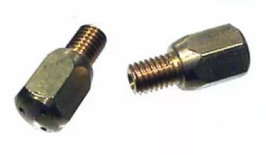 Two metal jets with threaded ends and hexagonal bodies rest on a white surface, resembling the 1st-line Gold3HoleSilvia Steam Wand Tip—3 hole, gold, for Silvia V2 or older. © 2025 1st-line.com