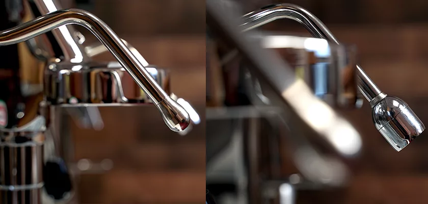 Close-up of two La Nuova Era espresso machine steam wands with shiny metal finishes; the left has a rounded tip, while the right, from the DISCONTINUED La Nuova Era Cuadra HX Espresso Machine, features a nozzle-shaped tip. © 2025 1st-line.com