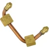 The Bezzera 5194601LL Pipe is a bent copper pipe with brass fittings and nuts on both ends, ideal for plumbing or refrigeration connections. © 2025 1st-line.com