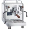 The Bezzera Duo DE V2 Dual Boiler Espresso Machine features stainless steel construction, wooden handles, dual steam wands, control buttons, a digital display, and Bezzera Duo branding on the front. © 2025 1st-line.com