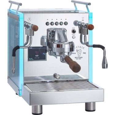 The Bezzera Matrix DE V2 Dual Boiler Espresso Machine features a reflective metal body, wooden handles, side LED lights, digital display, dual steam wands, and Matrix/Bezzera labels on the front. © 2025 1st-line.com