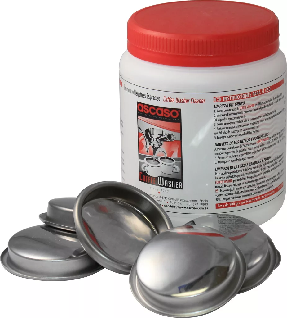 A container of Ascaso Coffee Washer cleaner with a red lid is shown alongside several metal espresso machine filters, perfect for regular Espresso Machine Maintenance and Backflush Frequency routines on a white background. © 2025 1st-line.com