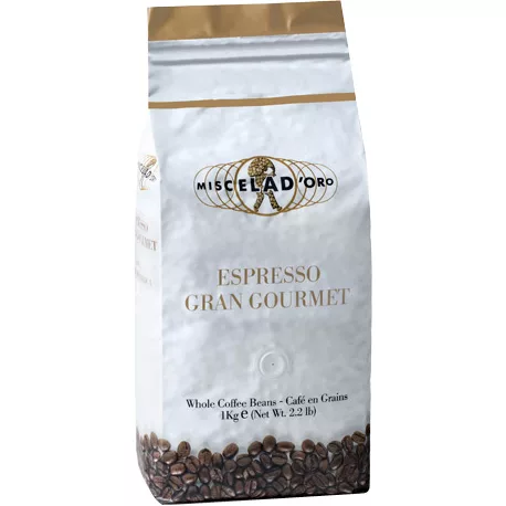 A discontinued 2.2 lb bag of Miscela dOro Gran Gourmet Roasted Coffee Beans, with gold and black accents, featuring roasted coffee beans imagery and English/French text on the packaging. © 2025 1st-line.com