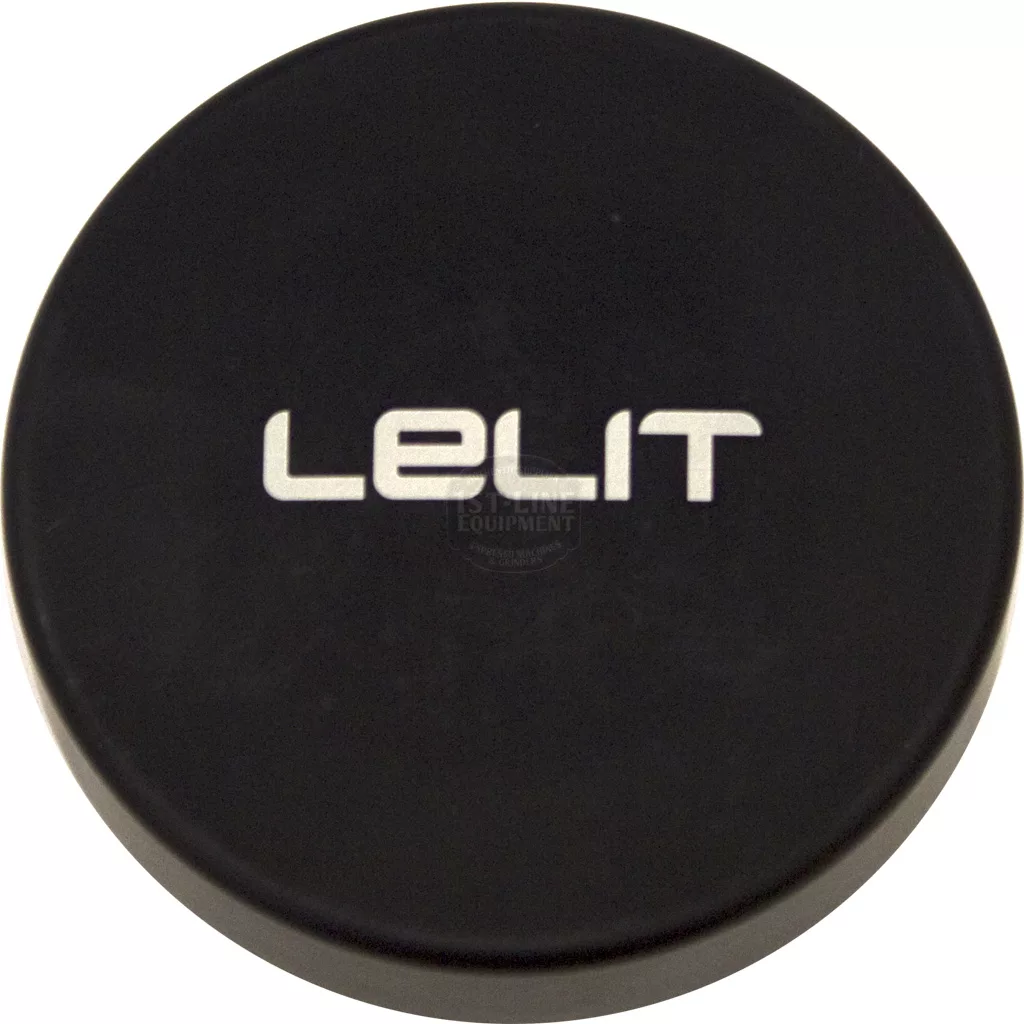 A round, black Lelit PLA482A 58.55 mm Pre-tamp Coffee Leveler with the brand and model number in bold white letters on top. © 2025 1st-line.com