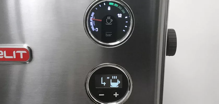 Close-up of the Lelit Elizabeth V3 Dual Boiler Espresso Machine’s control panel, featuring a pressure gauge with coffee cup icon, digital display, cup icons, plus/minus buttons, and sleek stainless steel finish. © 2025 1st-line.com
