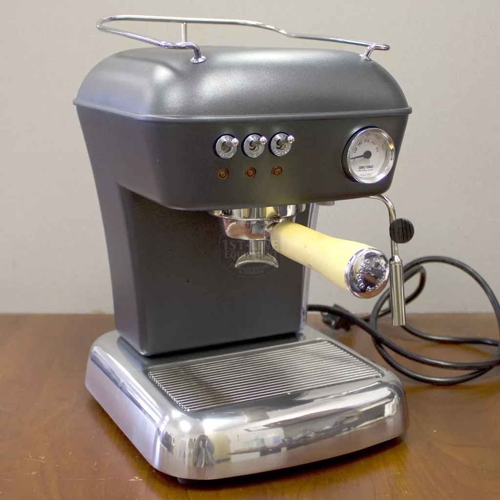 A SOLD Ascaso Dream UP V3 Anthracite Gray Espresso Machine (returned & refurbished) features a wood handle, wood steam knob, metal finish, three buttons, pressure gauge, steam wand, and portafilter. Power cord is visible. © 2025 1st-line.com