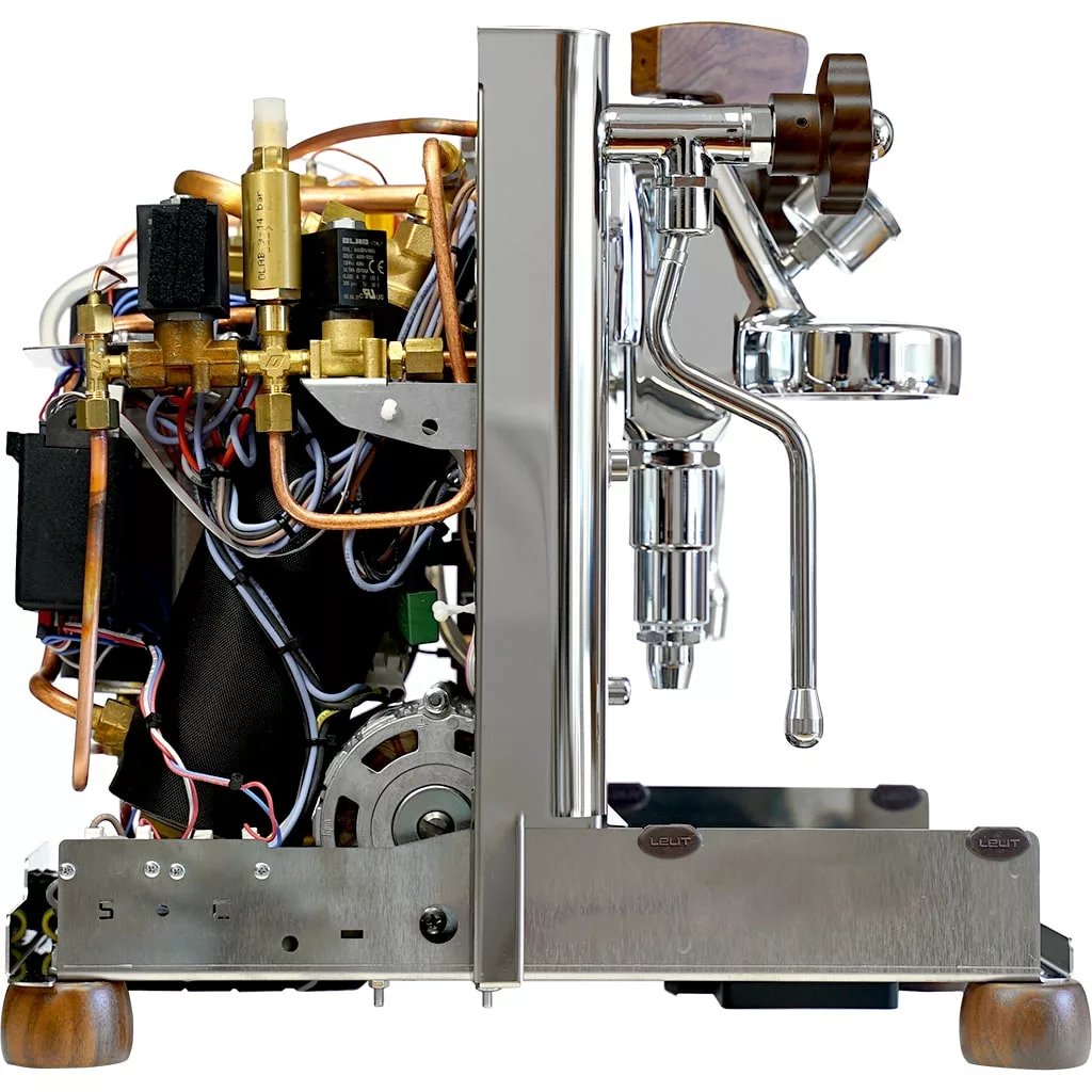 Side view of a partially open Lelit Bianca V3 Dual Boiler Espresso Machine revealing its intricate internal components—copper pipes, wires, metal structures—contrasting with the polished exterior and included portafilter. © 2025 1st-line.com