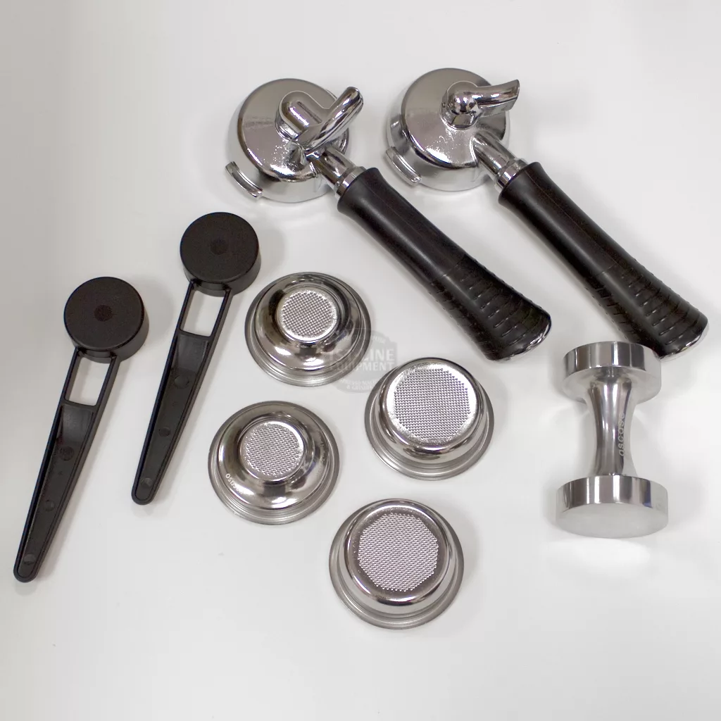 Assorted espresso accessories—including two black-handled portafilters, a metal tamper, dosing tools, and filter baskets—perfect for your SOLD RETURNED AND REFURBISHED Ascaso Bar 2 Group Espresso Machine (110V, direct connect). © 2025 1st-line.com