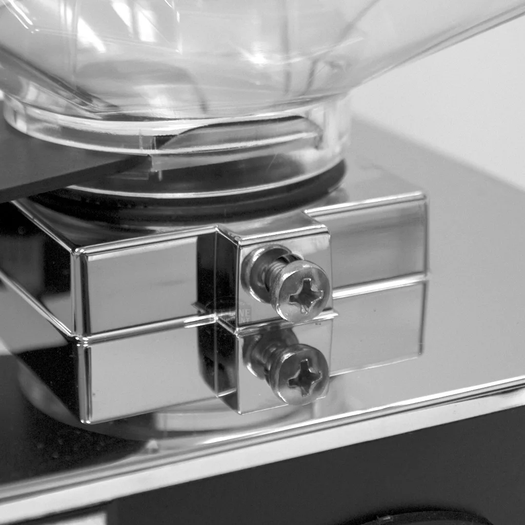 Close-up of the shiny metal surface on the DISCONTINUED Eureka Mignon Silenzio 50mm Espresso Coffee Grinder, showing a visible screw and part of the transparent container above, with reflections on the polished area below. © 2025 1st-line.com