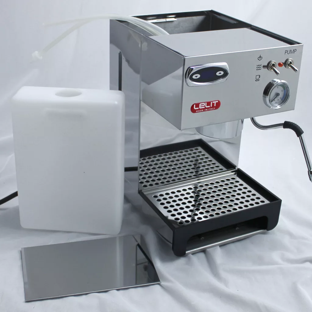 A stainless steel Lelit PL41TEM espresso machine with the water tank and metal drip tray cover removed, displayed on a white surface. The water tank and tray cover sit beside this elegant espresso machine. © 2025 1st-line.com