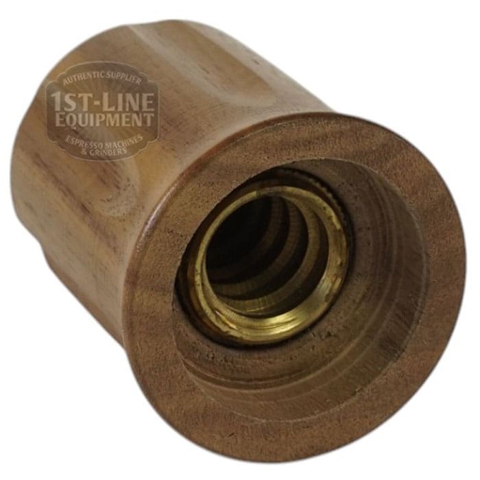 The Faema Compact Walnut Valve Knob with Neutral Chrome Plug is shown in a photo from the end, highlighting its cylindrical wooden design and chrome plug facing the camera. © 2025 1st-line.com