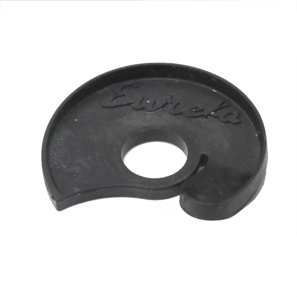 The Eureka 2580.0006 Atom Coffee Conveyor Wheel is a black, crescent-shaped plastic washer with Eureka embossed and a large central hole, designed as a replacement part for the Eureka Atom. © 2025 1st-line.com