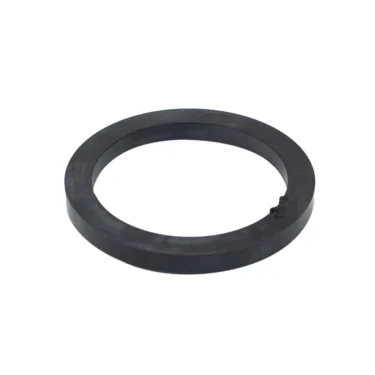 The W.556M 8mm MODERN PORTAFILTER HOLDER GASKET is a black rubber washer with a slightly rough surface and a small, uneven notch on one edge, shown on a white background. © 2025 1st-line.com