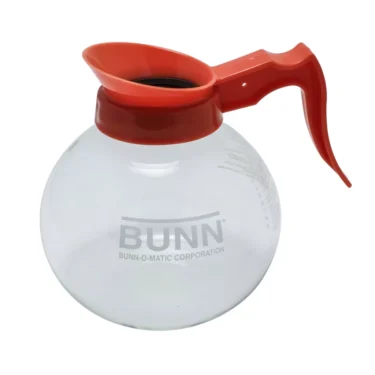 A clear Bunn Glass Coffee Decanter with an orange handle holds up to 12 cups (64 oz.). © 2025 1st-line.com