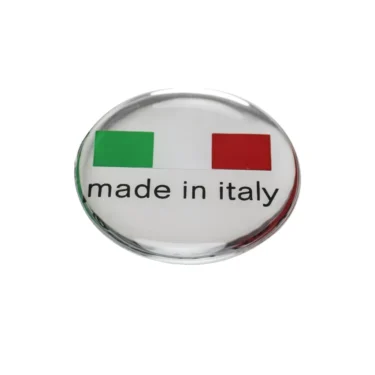 A round, clear Lelit MC261 Silver Label Made In Italy badge features a green and red square above the text on a white background, displayed against a plain white surface. © 2025 1st-line.com