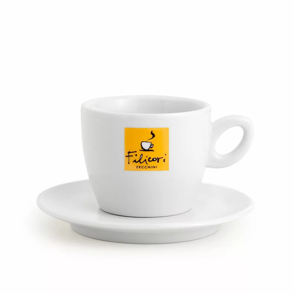 A DISCONTINUED Filicori Zecchini Porcelain Cappuccino Cup with a handle and matching saucer features a yellow square logo on white porcelain against a plain background. © 2025 1st-line.com