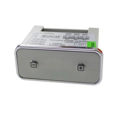 A rectangular stainless steel control panel with two buttons, one marked with a minus sign and the other with a plus sign. The device has a label with technical specifications on top. © 2025 1st-line.com