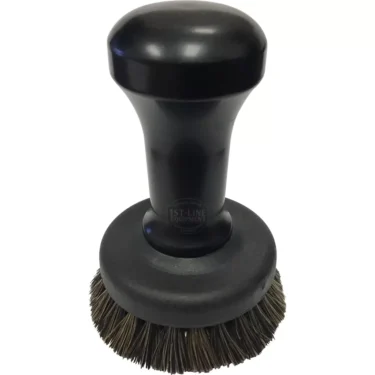 The 1st-line Bristle Brush Edge 58mm Espresso Coffee Tamper features a wide black handle and dense, circular bristles for easy grip and efficient cleaning of espresso tamper bases up to 58mm. © 2025 1st-line.com