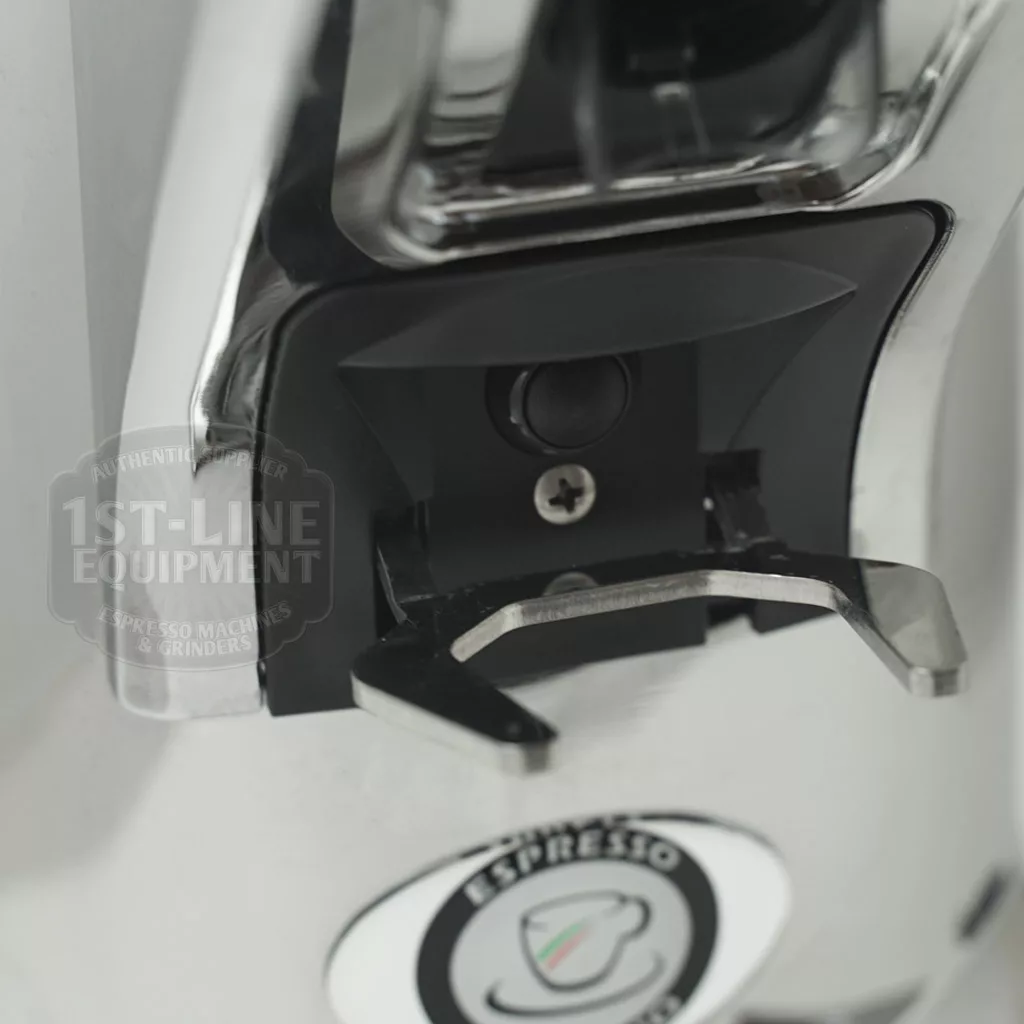 Close-up of a chrome portafilter holder with the 1st-Line Equipment logo—ideal to pair with the DISCONTINUED Eureka Zenith 65 E Espresso Coffee Grinder, featuring durable steel burrs and a tall bean hopper. © 2025 1st-line.com