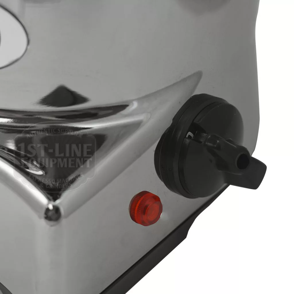 Close-up of the DISCONTINUED Eureka Zenith 65 E Espresso Coffee Grinder with durable steel burrs, tall bean hopper, black switch, red indicator light, and 1st Line Equipment text reflected on its shiny metallic surface. © 2025 1st-line.com