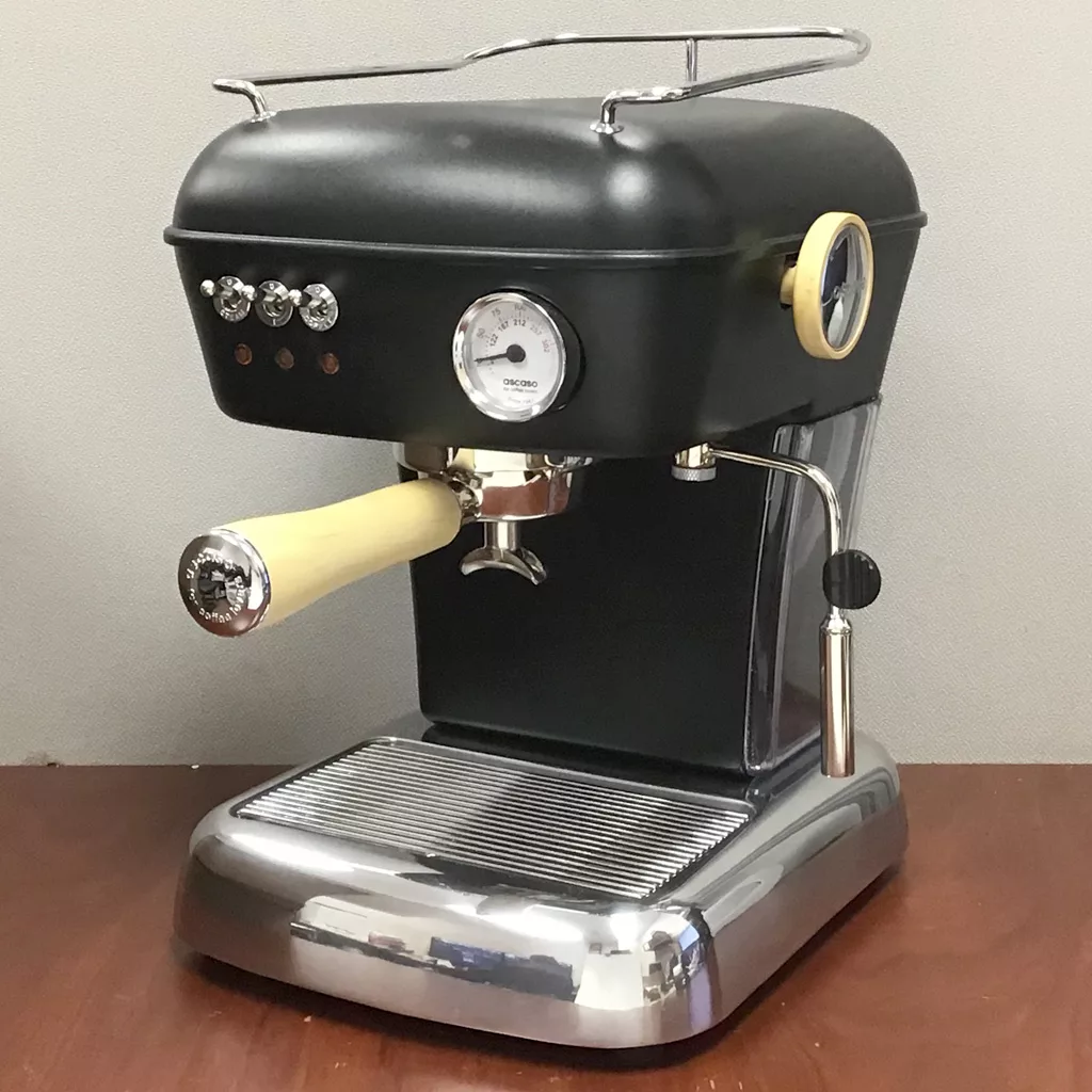A returned, refurbished SOLD Ascaso Dream UP V3 Dark Black Espresso Machine with wood handle and steam knob is displayed on a wooden surface against a plain gray background. © 2025 1st-line.com