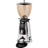 A shiny, chrome Elektra MXD coffee grinder features a large, translucent bean hopper on top, a digital display, and a spout for dispensing ground coffee. The base includes a black tray for catching excess grounds. © 2025 1st-line.com
