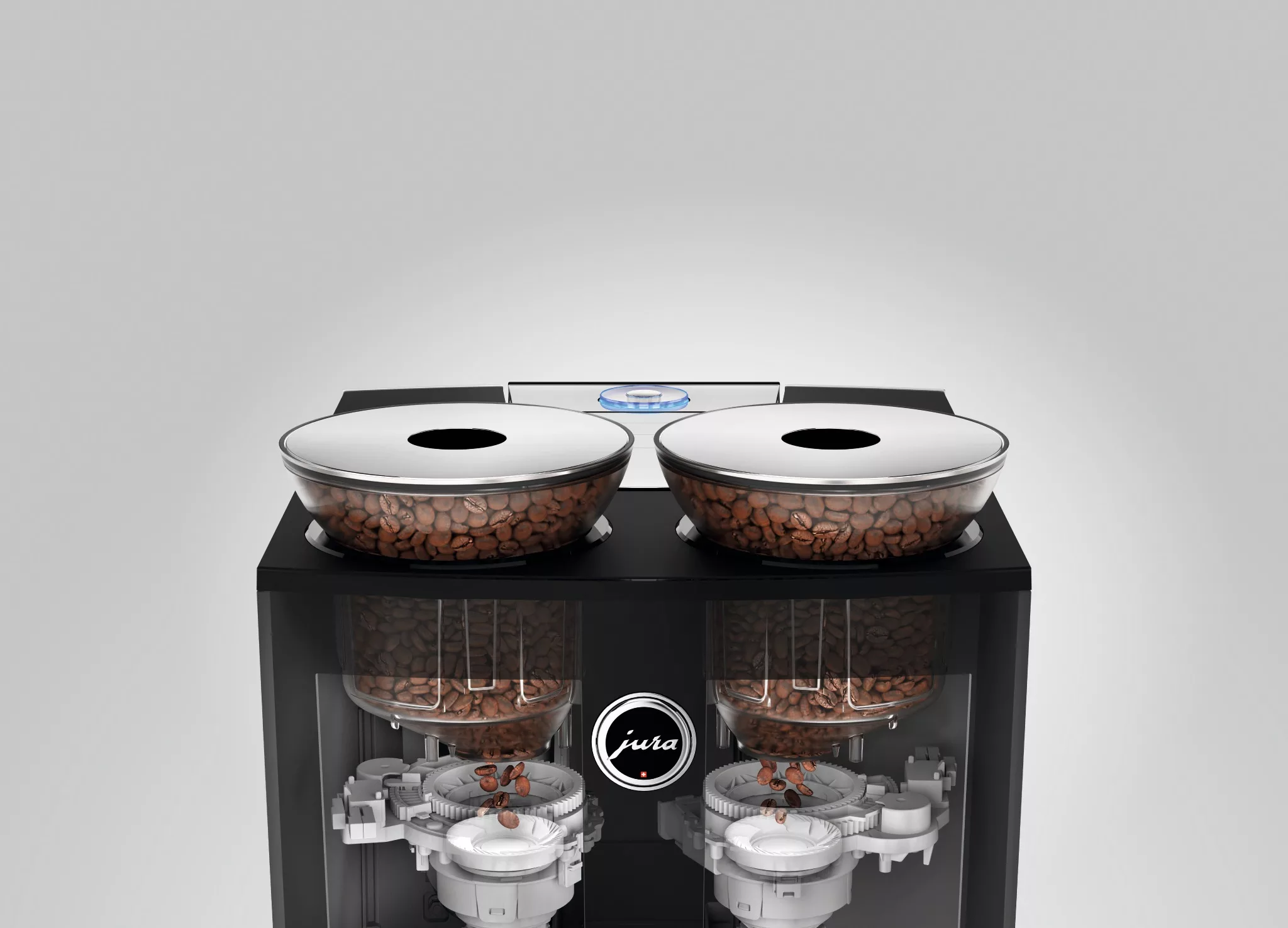 The DISCONTINUED Jura GIGA 6 Automatic Coffee Machine - Aluminum has dual transparent bean hoppers and a sleek aluminum design, displayed front-facing on a plain light gray background with the Jura logo visible. © 2025 1st-line.com