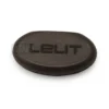 A Lelit 8600009 Rubber Spacer, black and oval-shaped with “LELIT” engraved, is shown on a white background. © 2025 1st-line.com