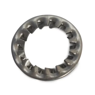 A close-up of the Bezzera 7814201 Washer for Assembly Tap Fitting, a metallic lock washer with internal teeth, is displayed on a white background. © 2025 1st-line.com