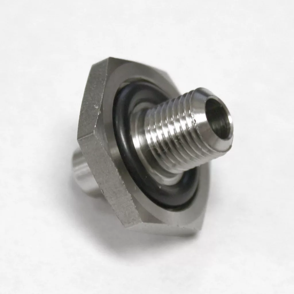 A metal threaded hexagonal fitting with a rubber O-ring, likely used for sealing connections in plumbing or machinery as a water tank adapter, is shown on a plain white background. © 2025 1st-line.com