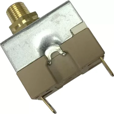 Close-up of the Ascaso I.1617 Regulator Pressure Switch featuring a brass threaded connector on top and two electrical prongs at the bottom for wiring, designed for use with Ascaso I.1617 machines. © 2025 1st-line.com