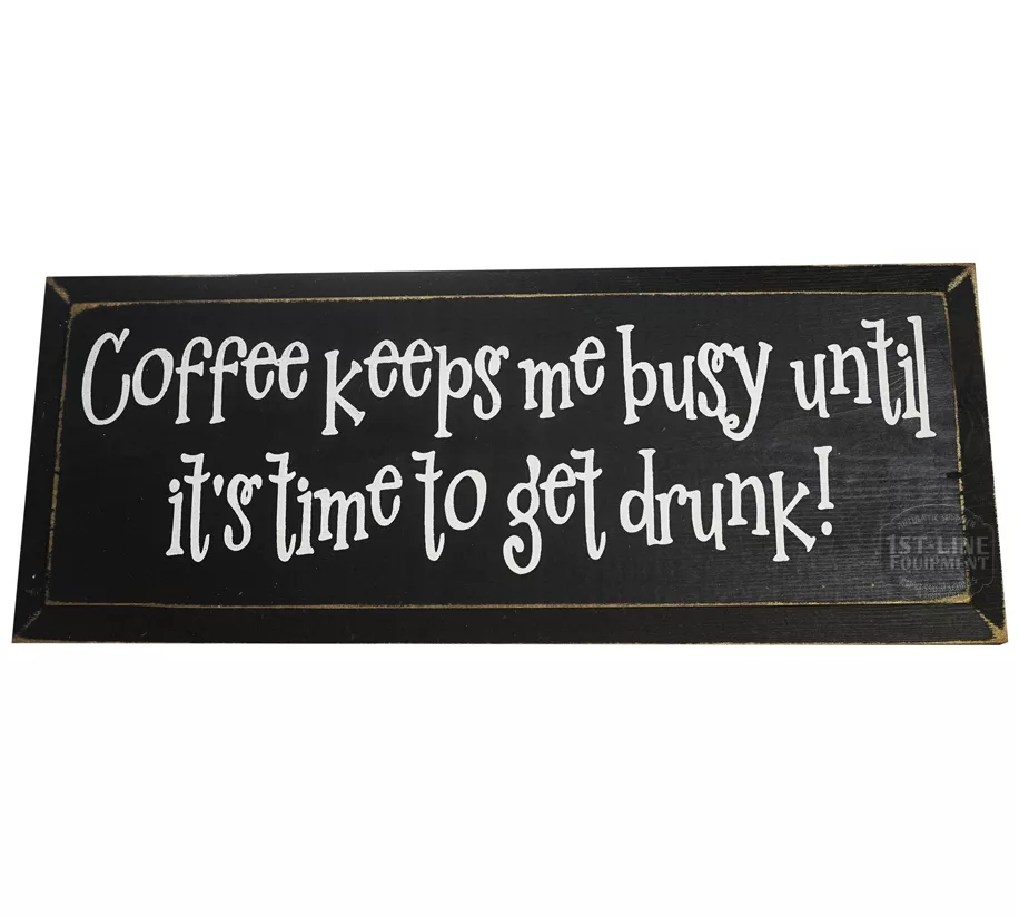 A black wooden sign with playful white text: Ill start working when the coffee does. Perfect office decor for coffee lovers who enjoy witty quotes. © 2025 1st-line.com