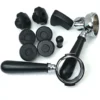 Lelit PLA2201 Black Wood Kit parts—including two black portafilter handles, four rubber feet, two knob handles, a small black plug, and a plastic part—are arranged on a white background. © 2025 1st-line.com