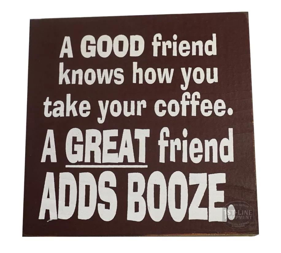 The A GOOD friend knows how you take your coffee... sign features white text on a brown background, with emphasis on GOOD, GREAT, and ADDS BOOZE in the phrase: A GOOD friend knows how you take your coffee. A GREAT friend ADDS BOOZE. © 2025 1st-line.com