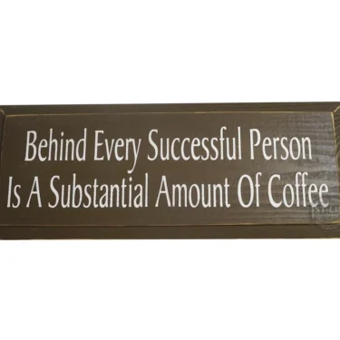The Behind Every Successful Person Is A... sign by 1st-line Equipment is a brown wooden sign with white text that reads, Behind Every Successful Person Is A Substantial Amount Of Coffee. © 2025 1st-line.com
