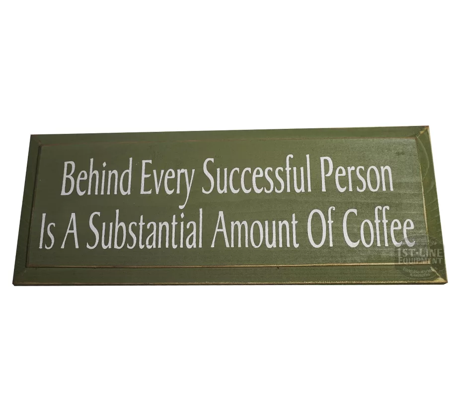 The Behind Every Successful Person Is A... Sign by 1st-line Equipment is a green wooden motivational sign featuring white text: Behind Every Successful Person Is A Substantial Amount Of Coffee. © 2025 1st-line.com
