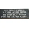 The Half the day, I wonder if its too late for coffee. The other... sign features white text on a dark background with a humorous message about choosing between coffee and alcohol throughout the day. © 2025 1st-line.com