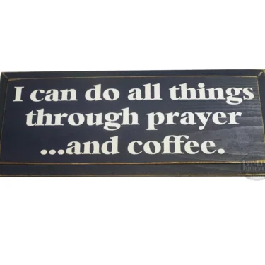 The I Can Do All Things Through Prayer & Coffee Sign is a rectangular black sign with white text—ideal for inspiring your space. © 2025 1st-line.com